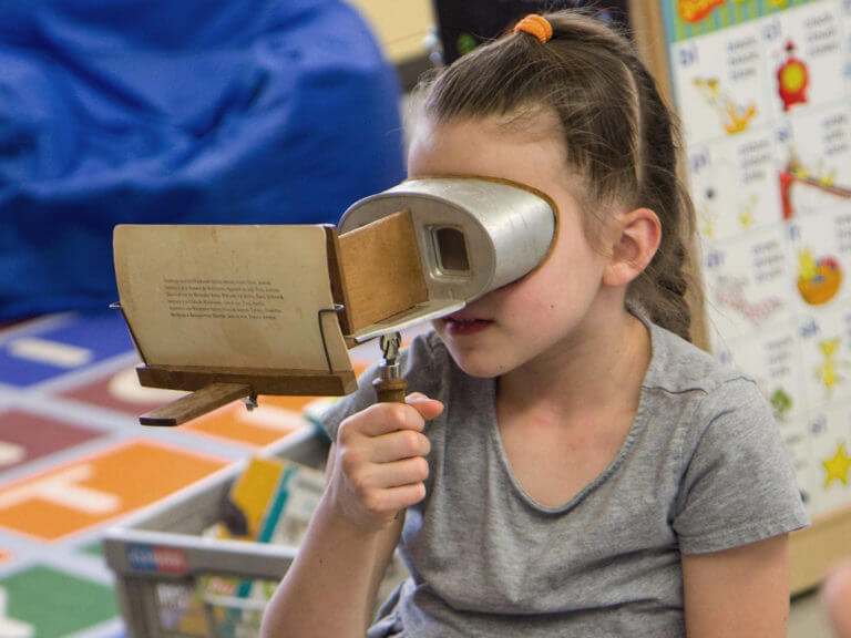 Student with photo viewer